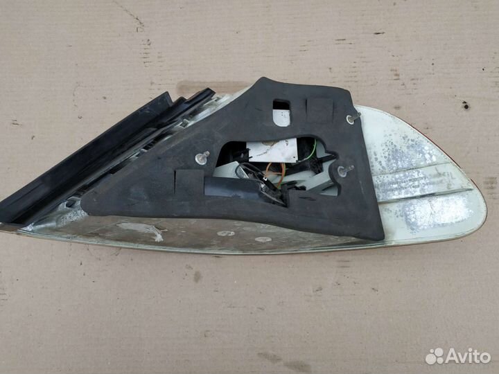 Фонарь задний левый bmw e65