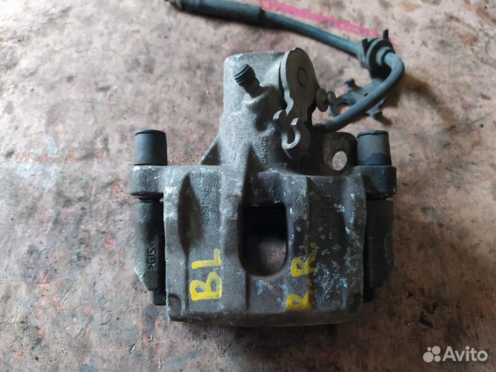 Суппорт задний Мазда 3 бл Mazda 3 BL