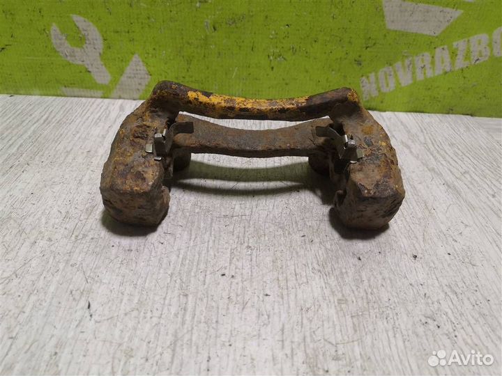 Скоба суппорта заднего Киа Сепия Шума 96-01