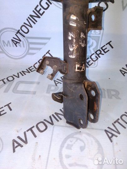 Стойка амортизатор передняя левая Nissan Cube