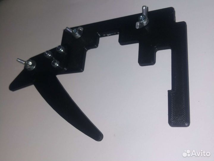 Препаратоводитель к предметному столику микроскопа