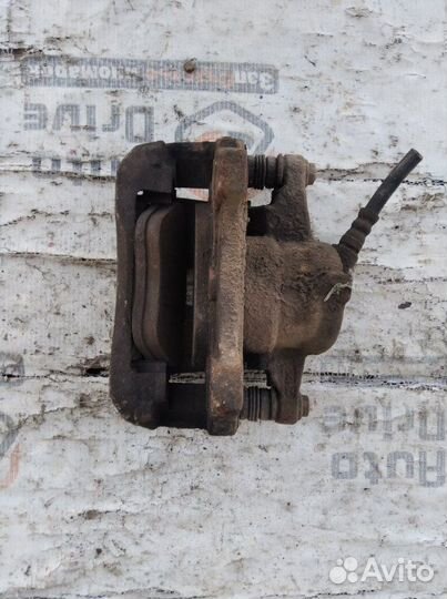 Суппорт тормозной передний левый Fiat Albea 1.4