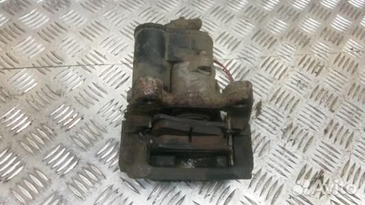 Суппорт тормозной задний левый volkswagen passat B