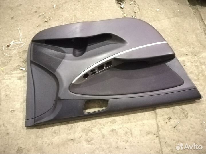 Обшивка двери передняя левая Hyundai Solaris 1