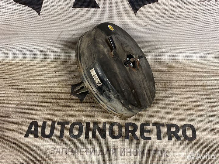 Тормозной вакуумник Nissan Almera N16 47210BM410