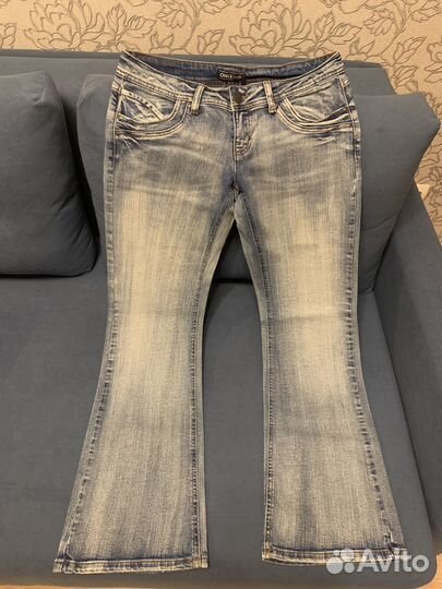 Джинсы клеш