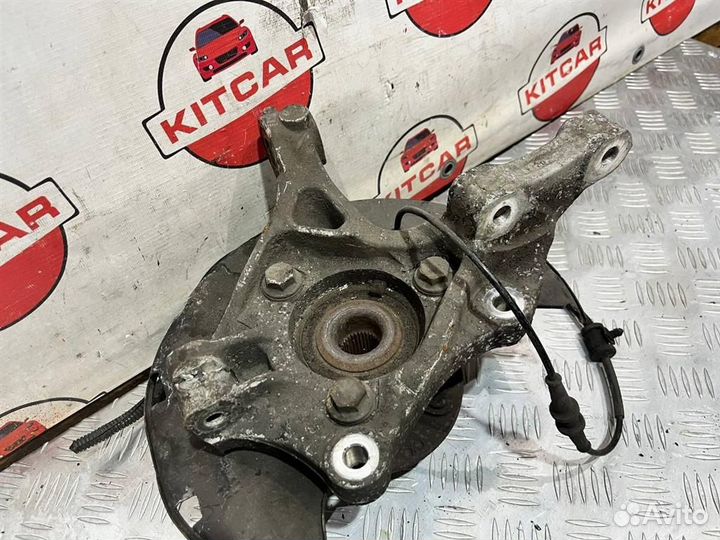 Кулак поворотный левый Opel Astra J