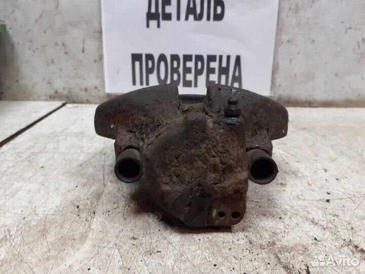 Суппорт тормозной передний правый Volkswagen