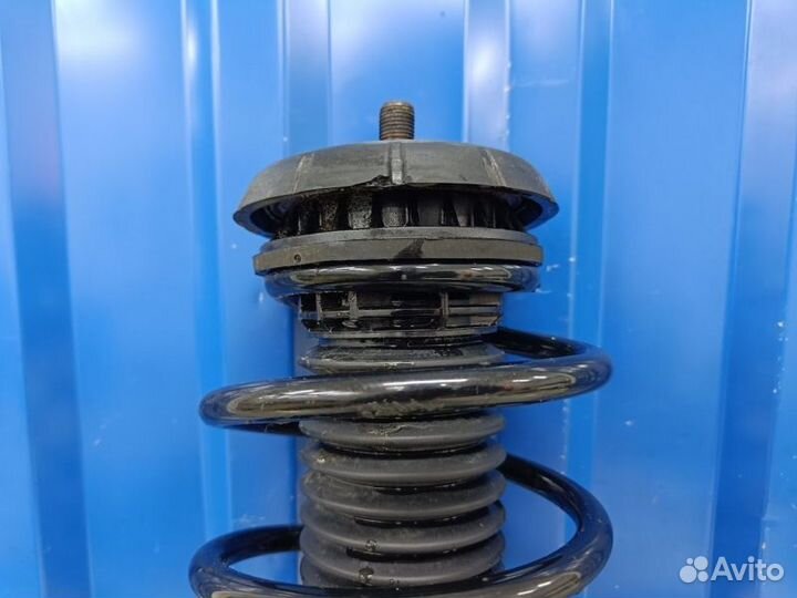 Амортизатор передний левый Peugeot 301 DD 1.6 NFP