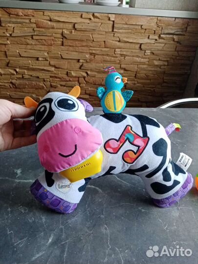 Игрушка музыкальная корова Lamaza