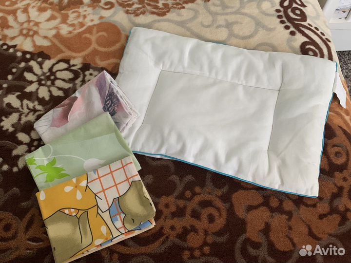 Детская подушка от рождения до года