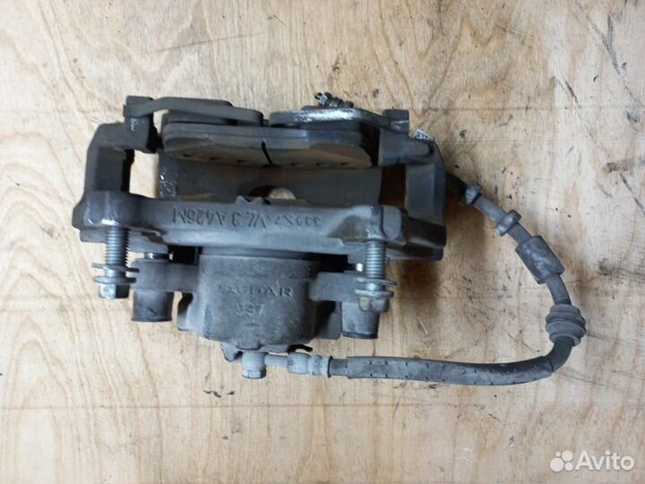 Суппорт передний левый