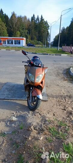 Макси скутер