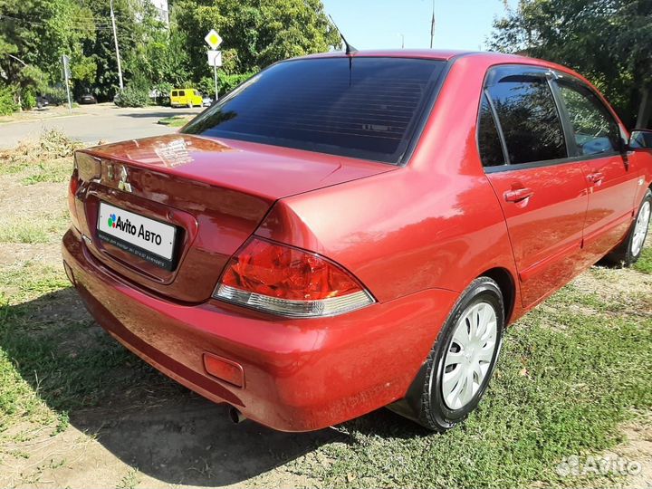 Mitsubishi Lancer 1.6 МТ, 2009, 133 000 км