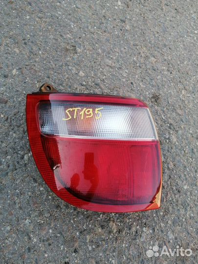 Стоп-сигнал Caldina ST195 задн. левый