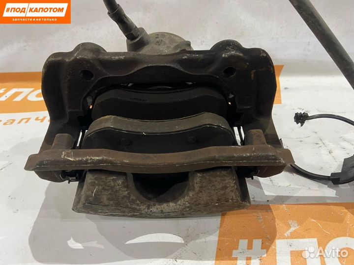 Суппорт тормозной передний левый Mercedes-Benz