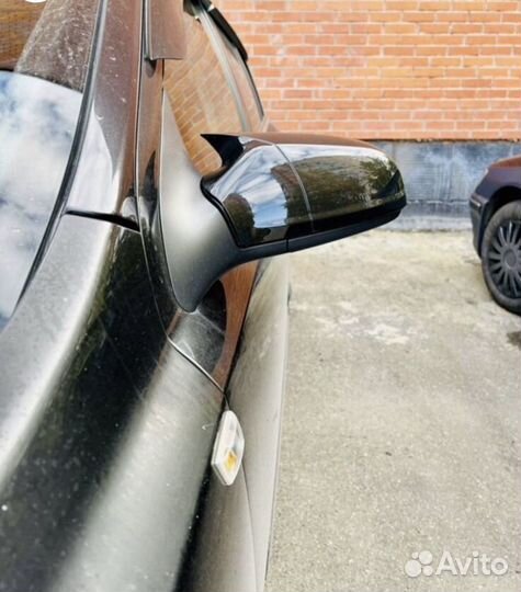 Накладка зеркала Опель астра н