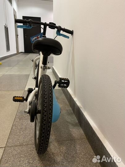 Велосипед btwin Dragon 14 с боковыми колесами