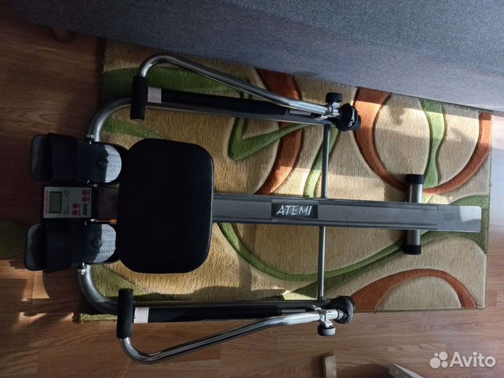 Гребной тренажер