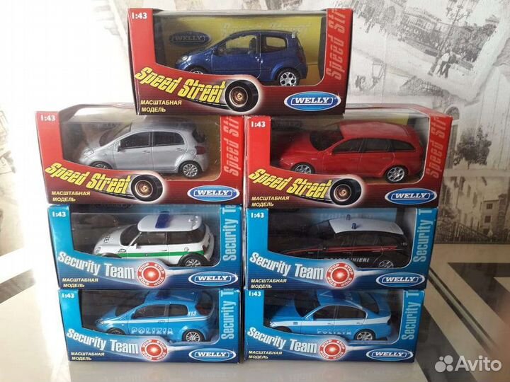 Модели машинок 1:43 Welly