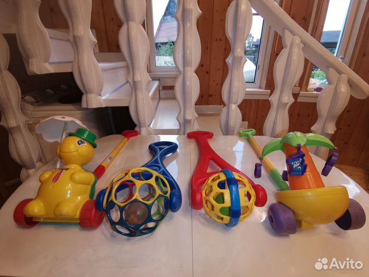 Детская каталка с ручкой oball развивающие игрушки