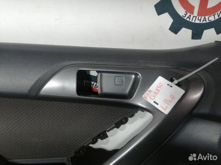 Обшивка двери передняя левая Kia Cerato TD G4FC