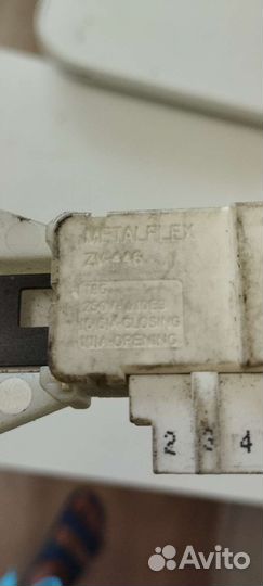 Замок люка на стиральную машину