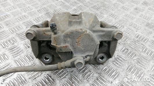 Суппорт тормозной передний левый toyota RAV 4 ZSA3