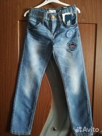 Джинсы новые