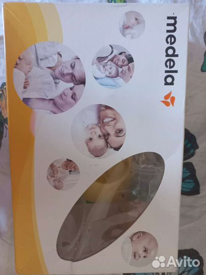 Молокоотсос medela
