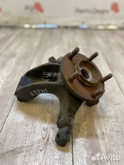 Кулак поворотный правый Mazda 3