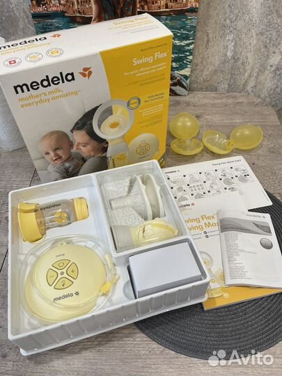 Молокоотсос medela swing flex электрический