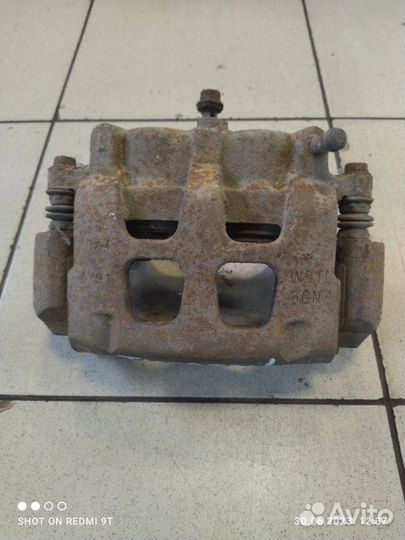 Суппорт тормозной передний левый Chery Tiggo 5 T21