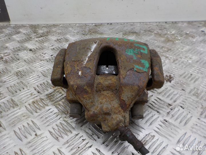 Суппорт тормозной передний правый Ford Focus II 20