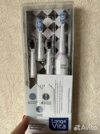 Электронная зубная щетка
