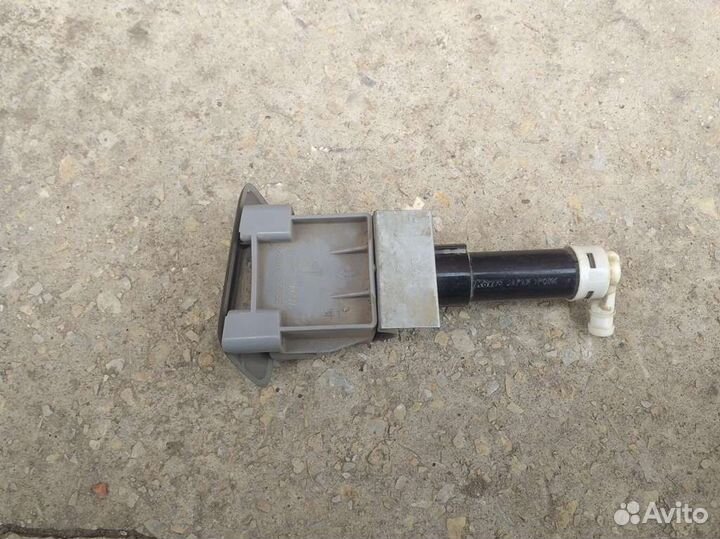 Форсунка омывателя Mitsubishi Pajero Sport 2