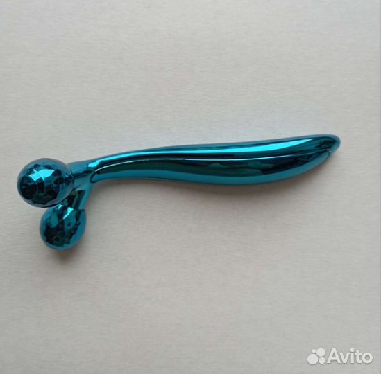 Роликовый массажер для лица