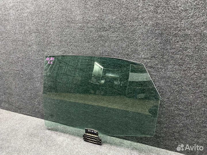 Стекло двери заднее левое Audi A4 B7