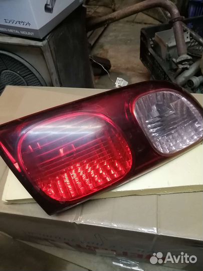 Фара Toyota Caldina левая задняя