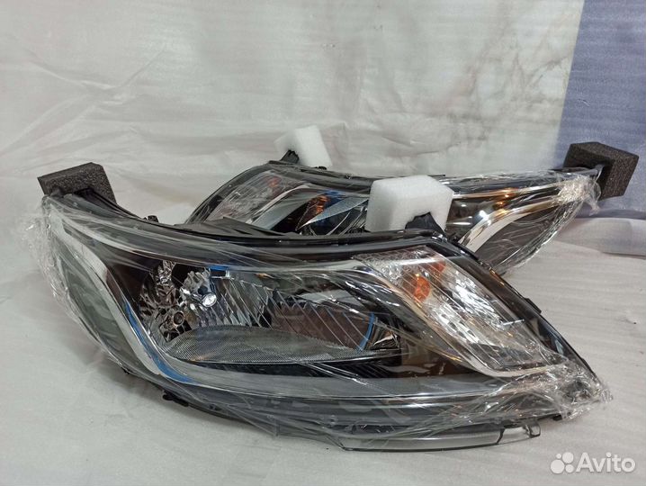 Фара левая Киа Рио 3 11-15