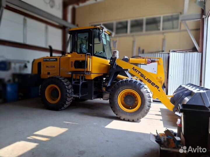 Фронтальный погрузчик