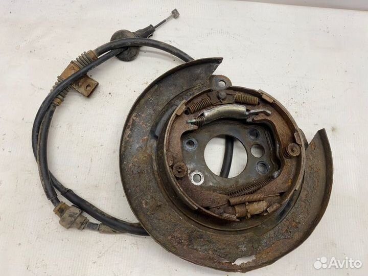 Механизм ручного тормоза задний левый Mitsubishi