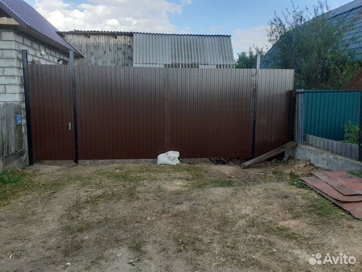 Заборы ворота,навесы