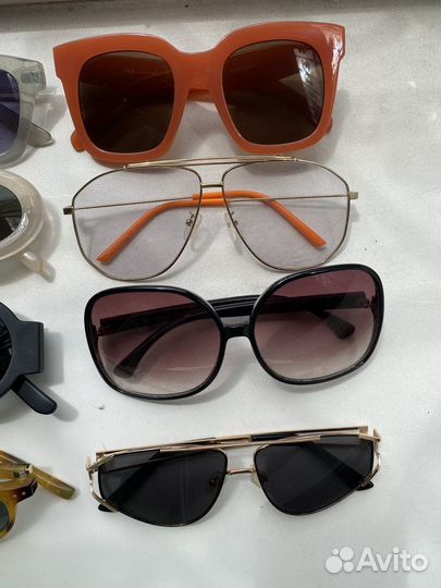 Солнцезащитные очки много