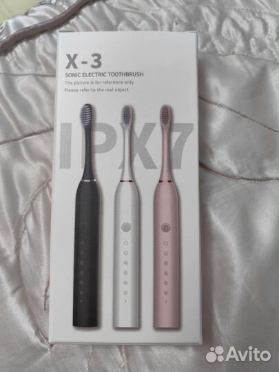 Электрическая зубная щётка