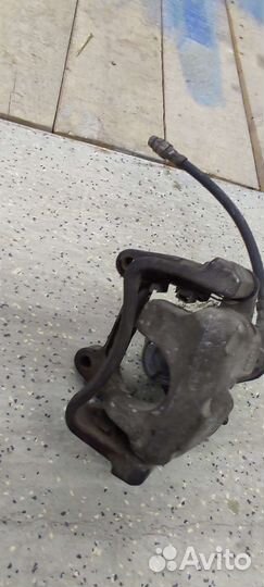 Суппорт задний прав 3C0615404F без электромотора