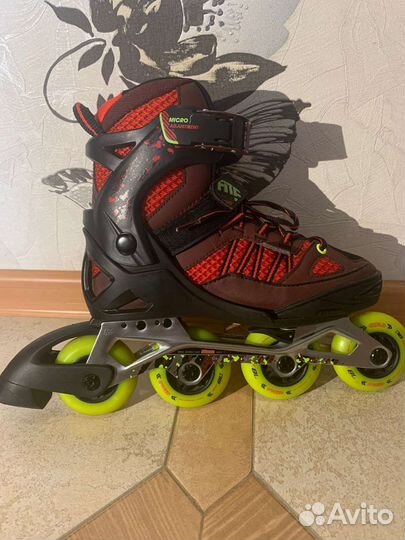 Роликовые коньки