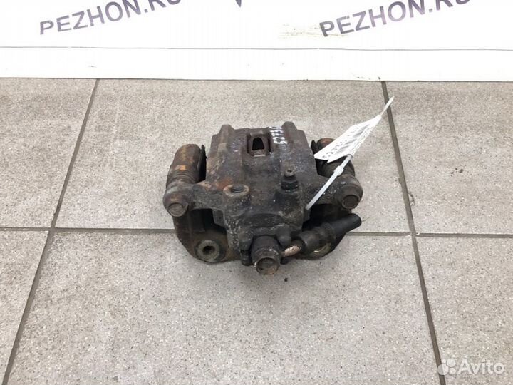 Суппорт тормозной задний левый Honda Accord