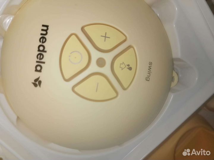 Молокоотсос medela электрический