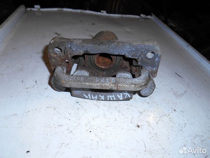 Суппорт задний левый Nissan Qashqai J10